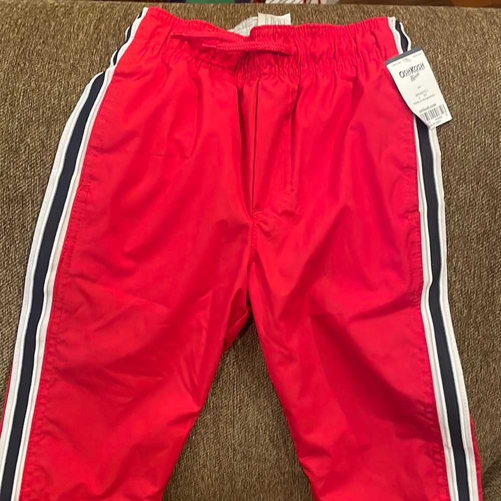 Never been worn Osh Kosh joggers. Size 6.
